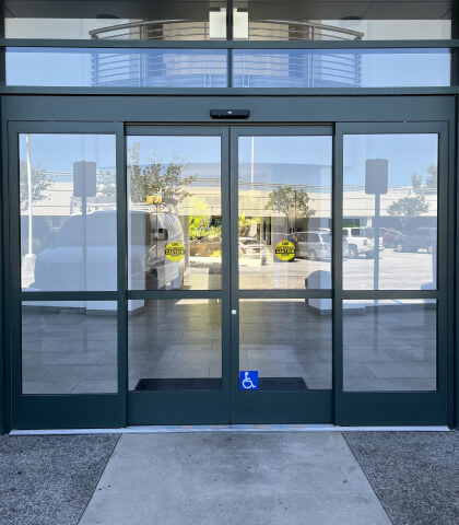 Exterior automatic sliding doors for commercial building