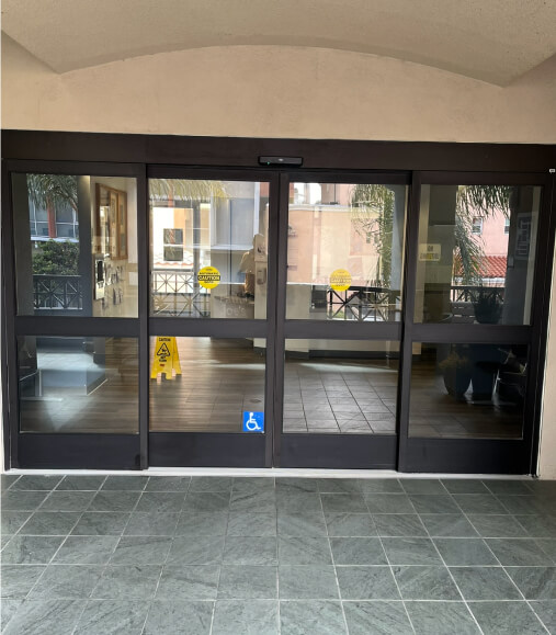 Interior automatic door at an office building installed by Patriot Commercial Doors