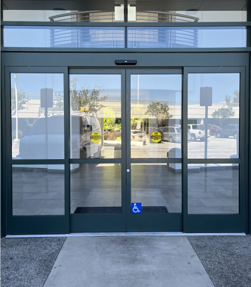 Exterior automatic door at a hospital installed by Patriot Commercial Doors